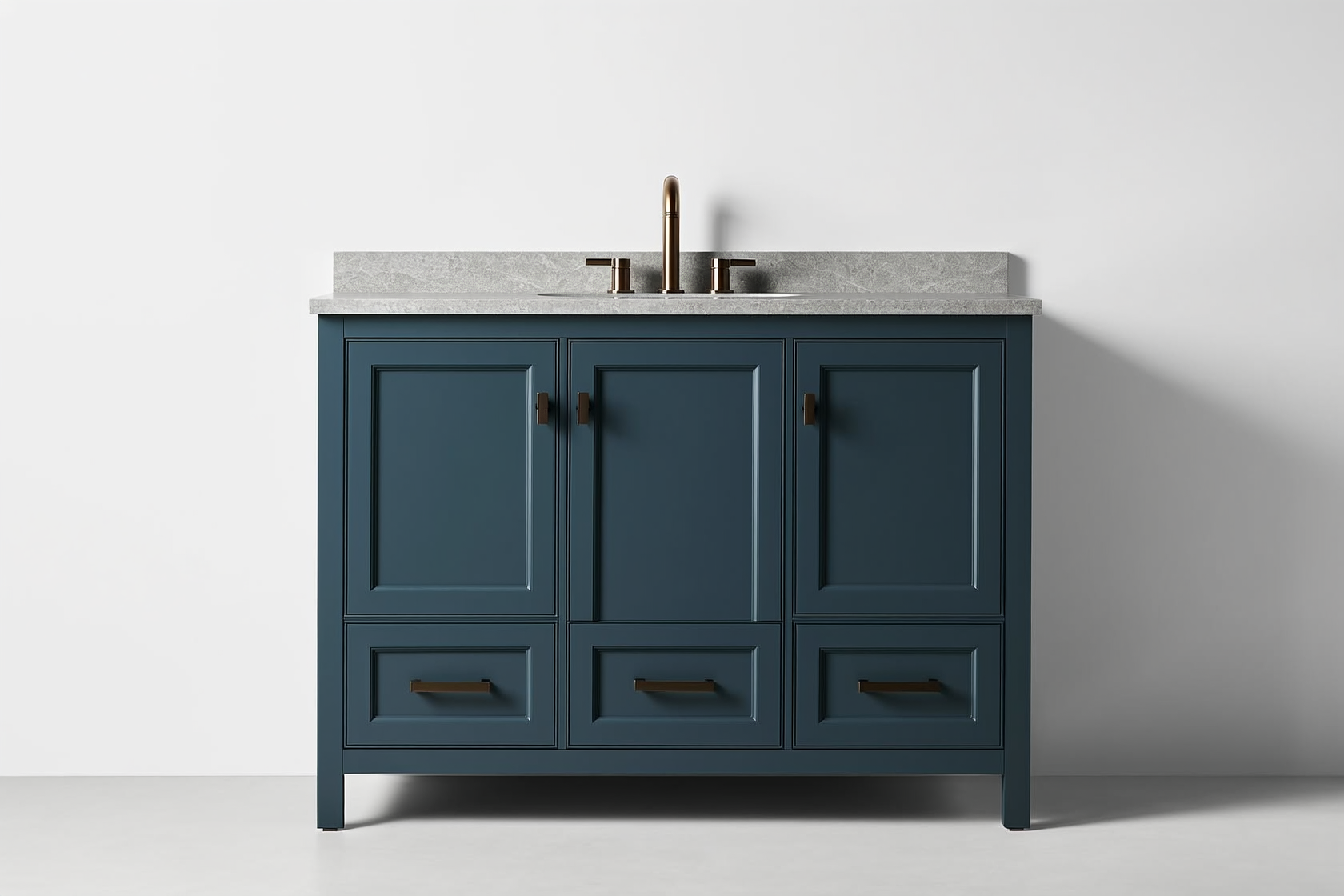 Modern bathroom vanity at standard height with stone countertop in a bright bathroom