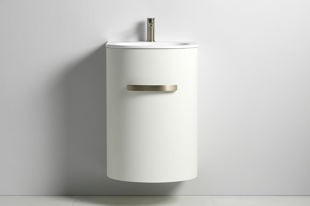 18-inch deep wall-mounted bathroom vanity in matte white with brushed nickel hardware in a small modern bathroom