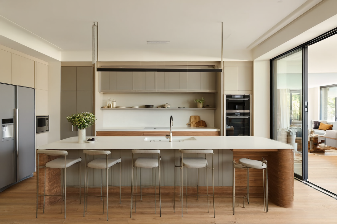 Modern kitchen with well-planned layout, island clearance, and integrated appliances