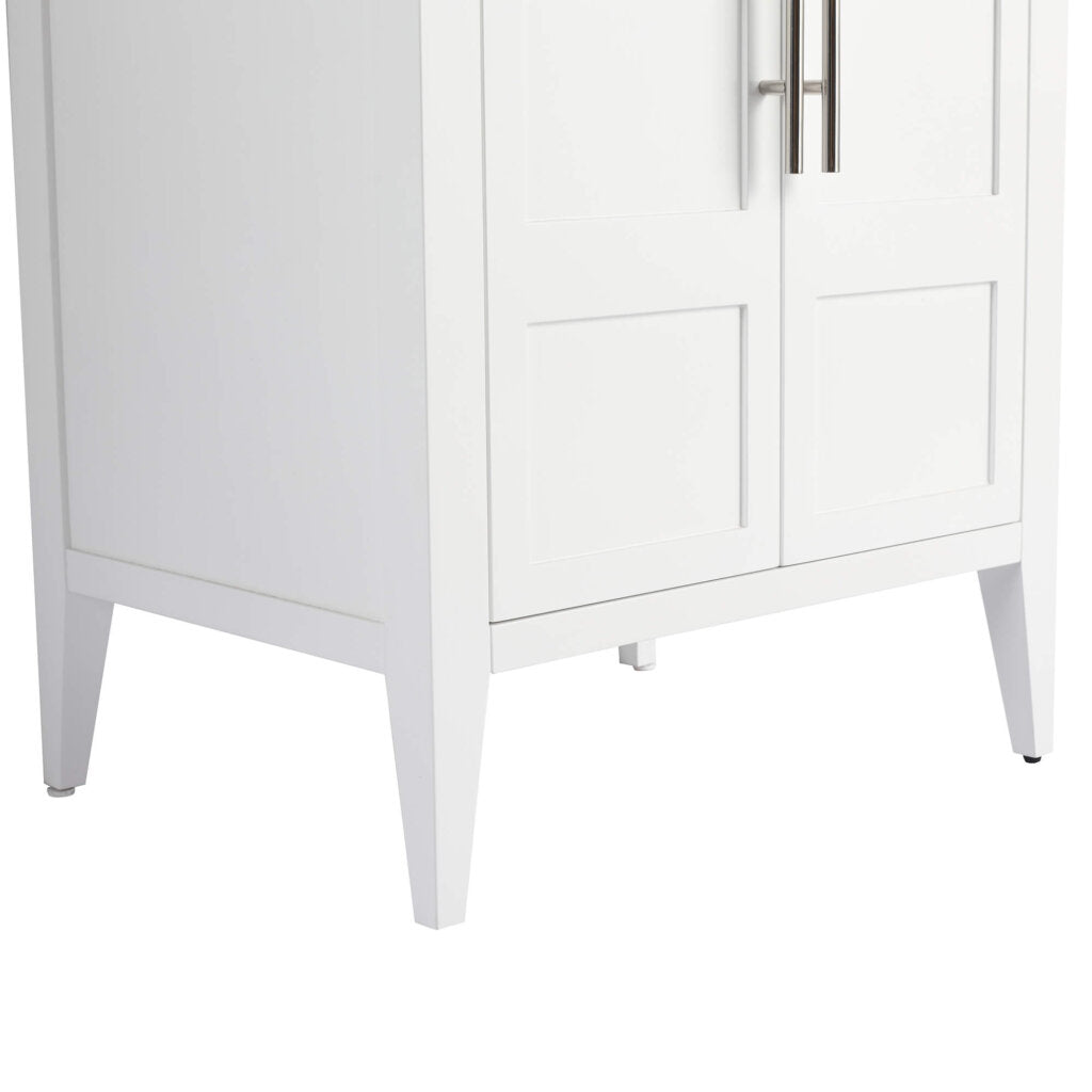 Corner view of the Leafside 24 Inch Bathroom Vanity With Sink, highlighting its white cabinet design, two paneled doors, metallic handles, and slender tapered legs.