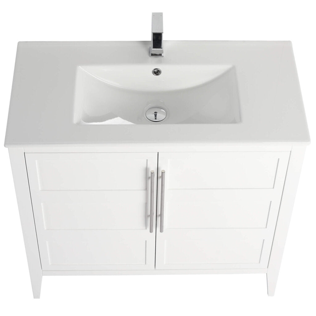 A top view of the Leafside 36 Inch Bathroom Vanity With Sink reveals its sleek rectangular sink and modern faucet. This vanity, featuring two cabinet doors with metallic handles, stands on four legs and showcases a minimalist design.