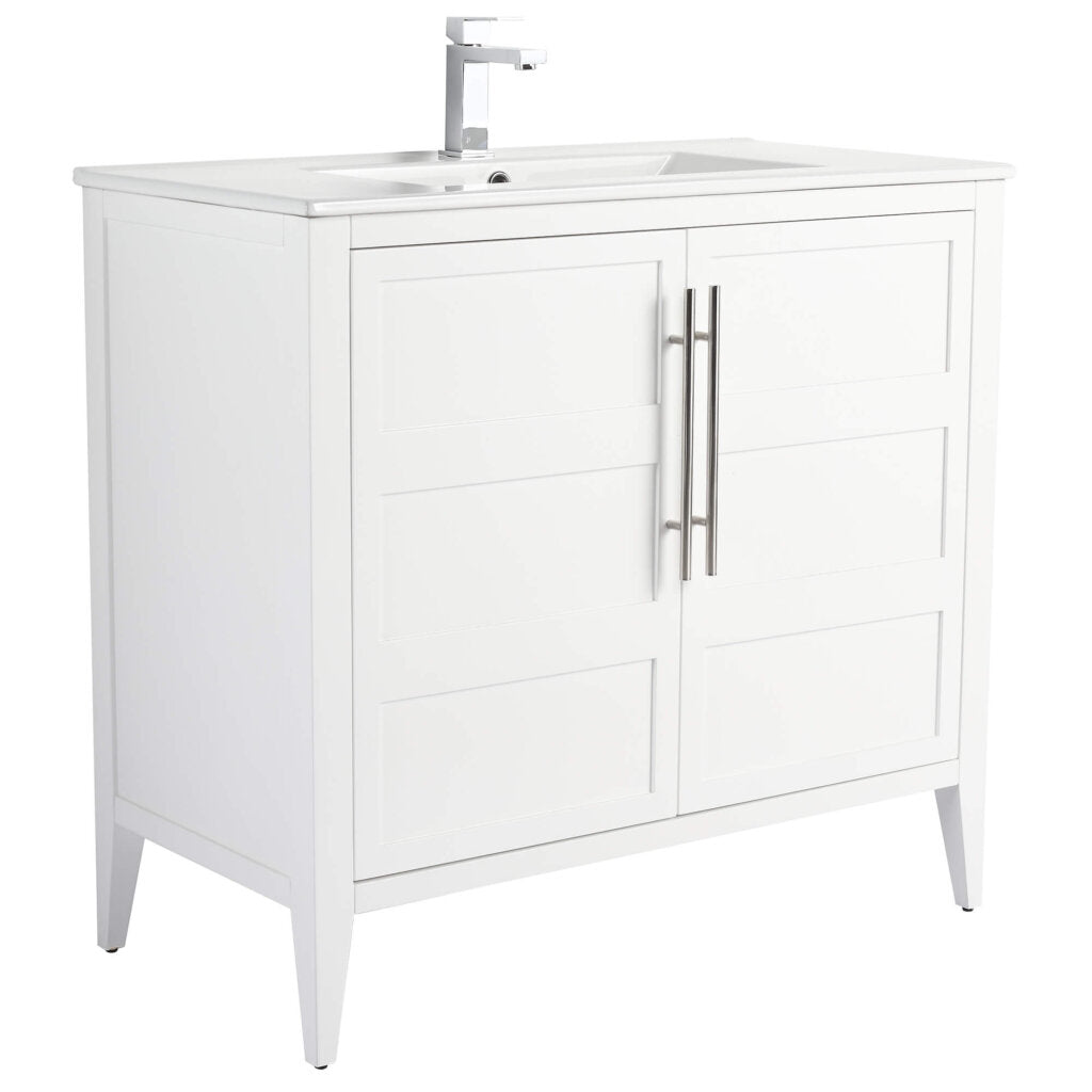 The Leafside 36 Inch Bathroom Vanity With Sink features a minimalist design, boasting a white finish and rectangular sink. It includes a single-lever faucet, two cabinet doors with vertical metal handles, and is supported by four tapered legs.