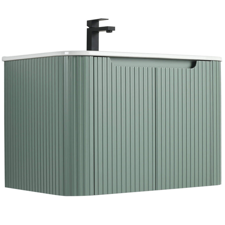The Caskvalley 30 Inch Wall Mounted Vanity features a modern ribbed texture, dual cabinet doors, a white countertop, and a sleek black faucet, embodying minimalist contemporary elegance.