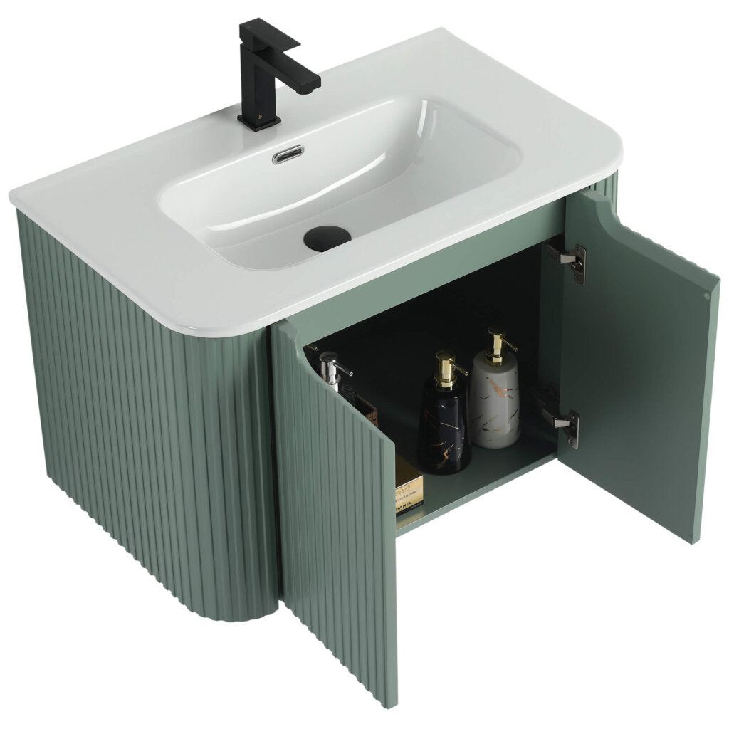The Caskvalley 30 Inch Wall Mounted Bathroom Vanity With Sink boasts a green finish, white sink, and elegant black faucet. Ribbed cabinet doors hide toiletries inside, while the sink is enhanced by a matching black drain and overflow hole.