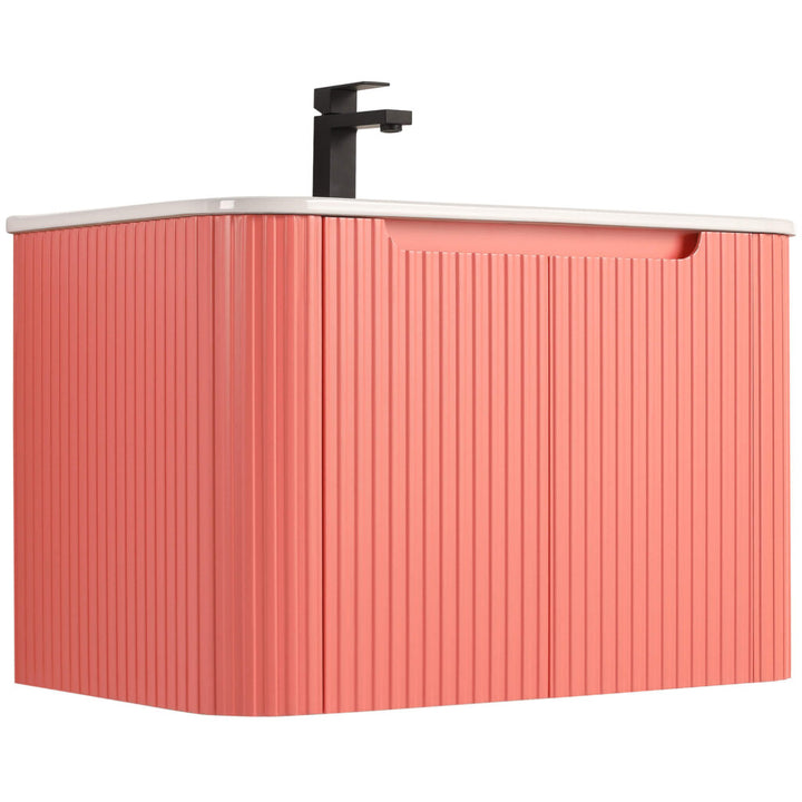 Discover the Caskvalley 30 Inch Wall Mounted Bathroom Vanity With Sink: a modern gem featuring a ribbed coral cabinet, white countertop, sleek black faucet, and integrated handle for minimalist sophistication in a rectangular shape.