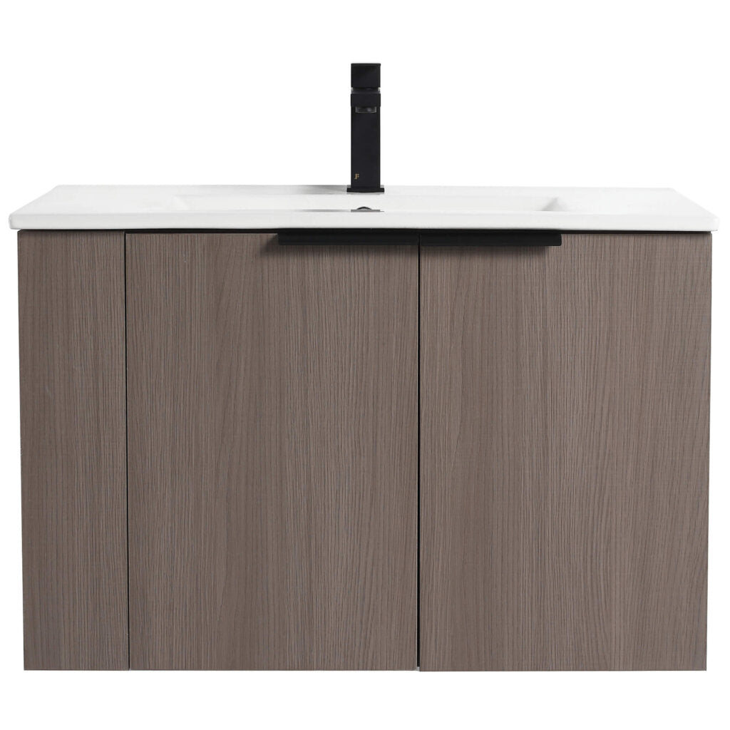The Elmridge 30 Wall Mounted Bathroom Vanity features a modern design with a wood-textured cabinet, two doors, and sleek black handle. Its integrated white countertop and minimalist black faucet enhance its contemporary aesthetic.