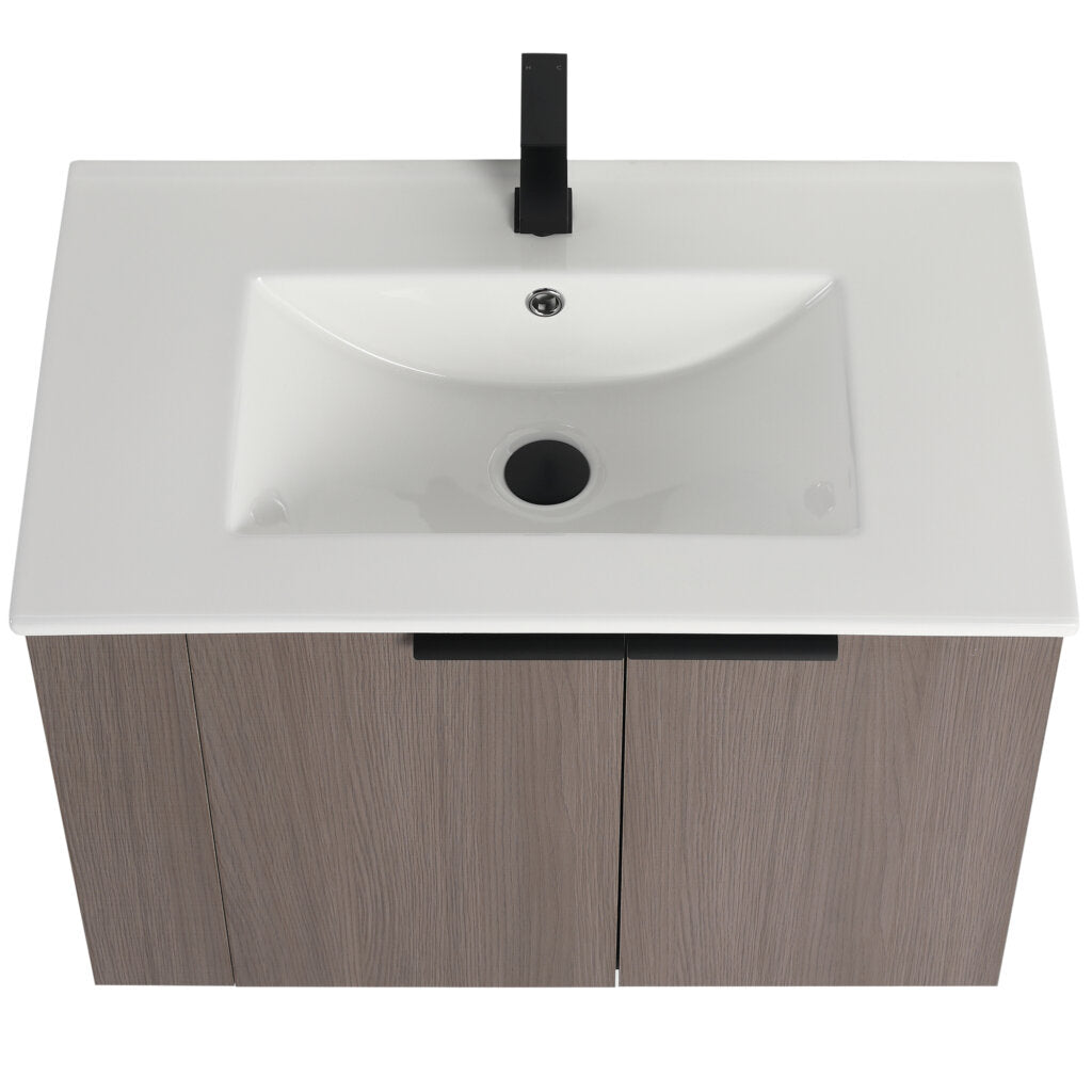 The Elmridge 30 Inch Wall Mounted Bathroom Vanity showcases a modern design with a white rectangular sink and black single-lever faucet. It features a wooden cabinet with sleek two brown doors, viewed from the top.