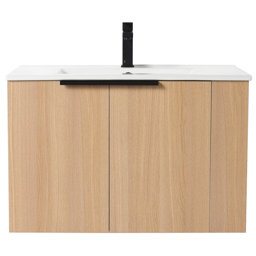 Explore the Elmridge 30 Wall Mounted Bathroom Vanity With Sink, a modern wooden design featuring a white countertop, two cabinet doors, and a sleek black faucet for minimalistic functionality.