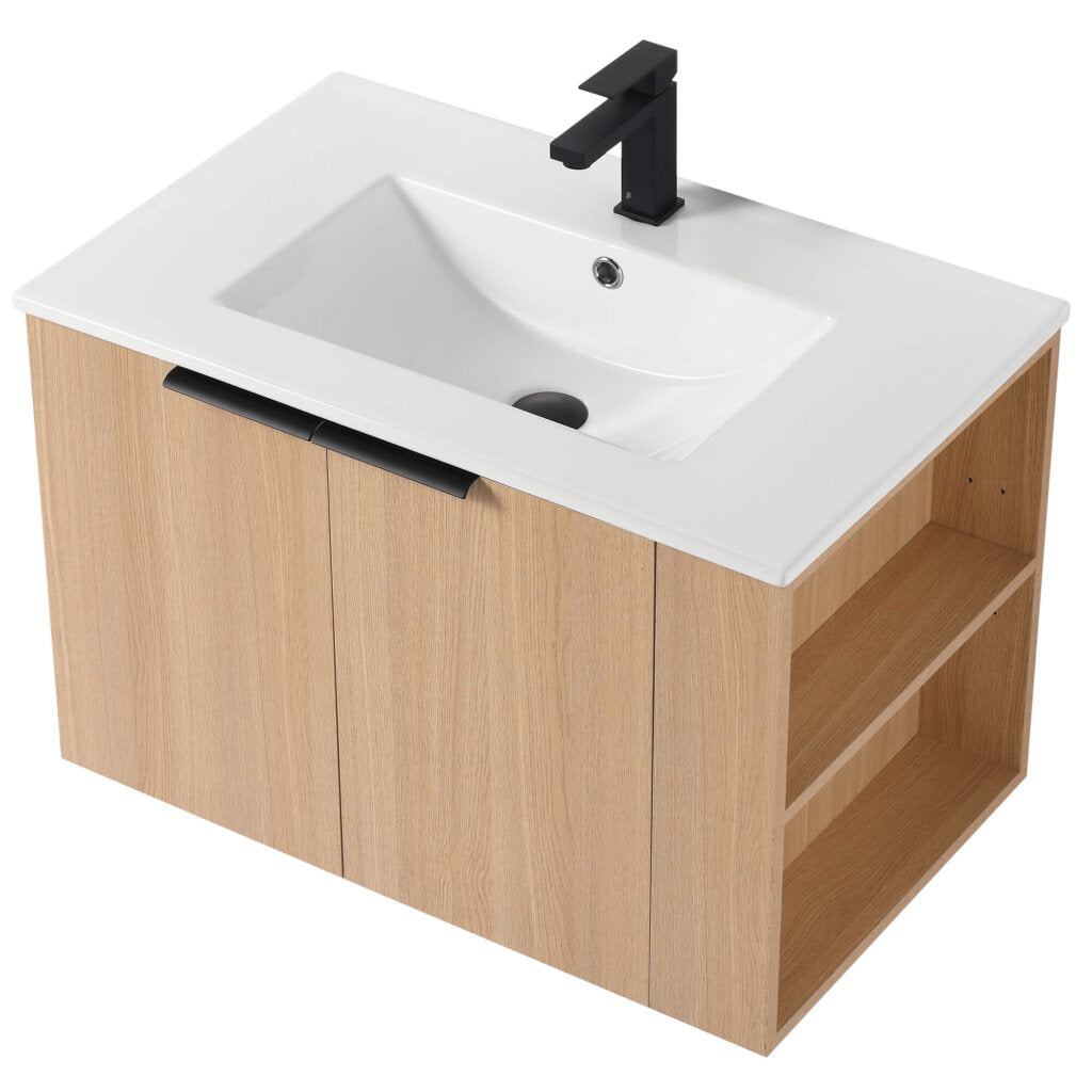 The Elmridge 30 Inch Wall Mounted Bathroom Vanity With Sink features a modern design with a rectangular white sink, sleek black faucet, light wood finish, two cabinet doors, and side open shelves for style and functionality.