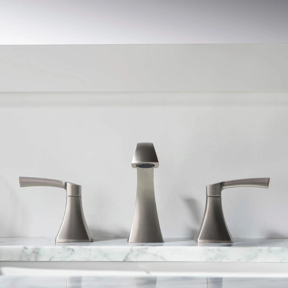 The Vermont 8 Inch Widespread Bathroom Sink Faucet in brushed nickel features two handles and a sleek, minimalist design, making it a stylish upgrade for your bathroom décor.