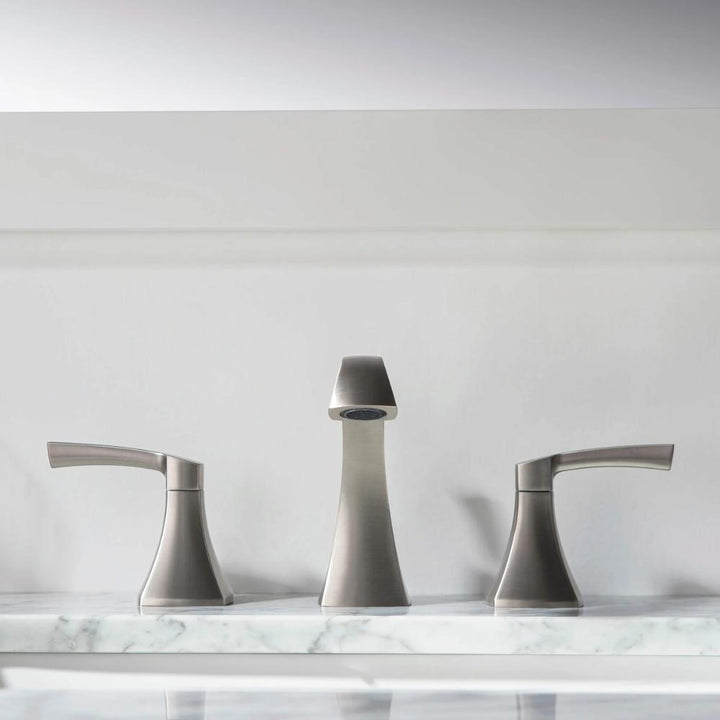 The Vermont 8 Inch Widespread Bathroom Sink Faucet in brushed nickel features two handles and a sleek, minimalist design, making it a stylish upgrade for your bathroom décor.