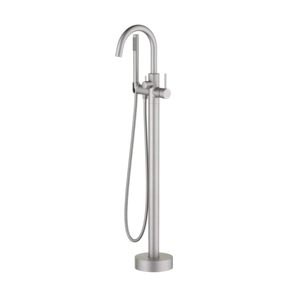 The Halo Floor Mount Tub Filler With Hand Shower in brushed metal has a tall curved spout, a single lever handle, and an attached handheld showerhead with flexible hose.
