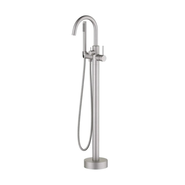 The Halo Floor Mount Tub Filler With Hand Shower in brushed metal has a tall curved spout, a single lever handle, and an attached handheld showerhead with flexible hose.