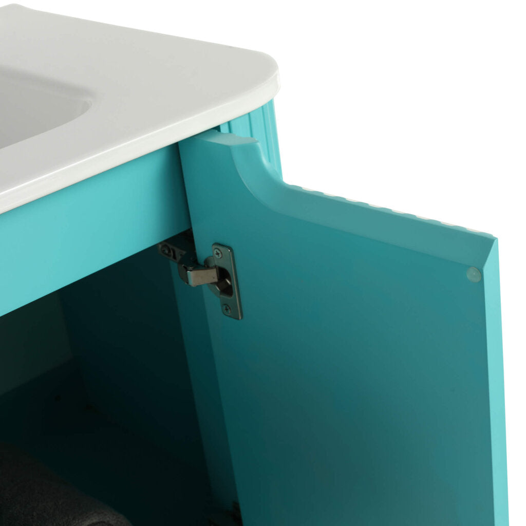 The Caskvalley 30 Inch Wall Mounted Bathroom Vanity With Sink features a turquoise cabinet and white countertop. A partially open door reveals a metal hinge, while a gray towel peeks out, accentuating the striking color contrast and meticulous craftsmanship.