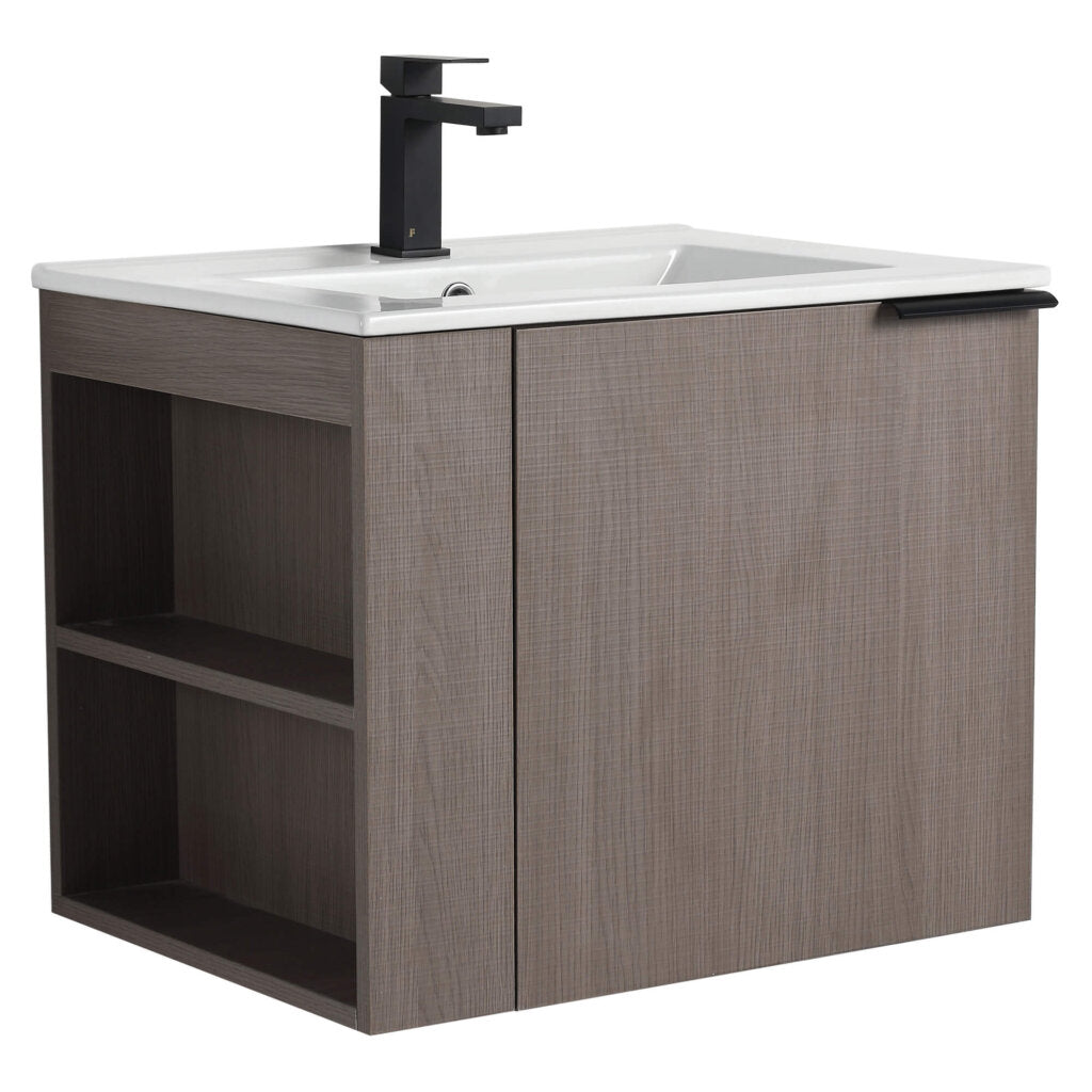 The Elmridge 24 Wall Mounted Bathroom Vanity features a modern gray wood finish, sleek rectangular white sink, and black faucet. It includes a left open shelf, right cabinet door with black handle for an elegant touch.