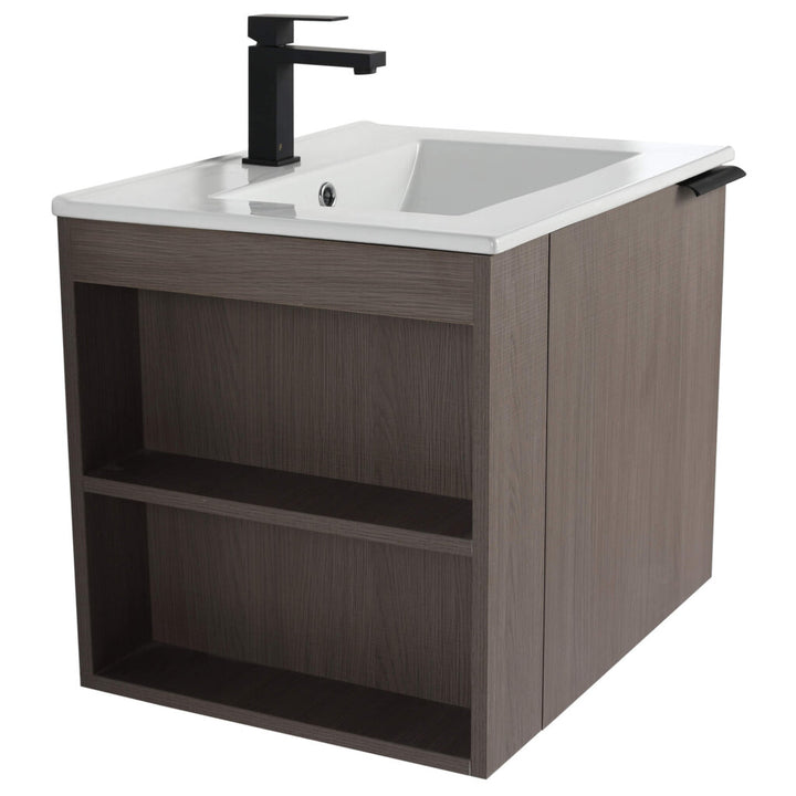 The Elmridge 24 Inch Wall Mounted Bathroom Vanity With Sink features a modern design with a white rectangular sink, black faucet, and a dark brown wooden cabinet. It includes open two-shelf storage and a side handle, all in a sleek, minimalist style.