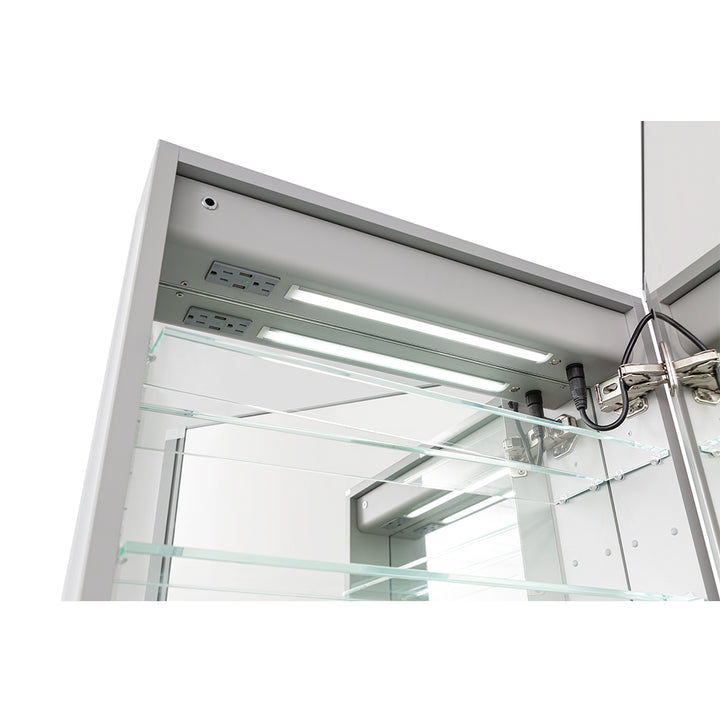 The Edge Royal 24 Inch Left Side LED Lighted Mirror Medicine Cabinet features built-in LED lighting, interior electrical outlets, and glass shelves. With one door open, the storage space and hinge mechanism inside are visible.