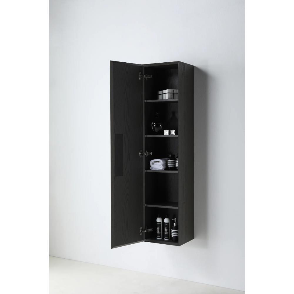 The Cartisan Design Side Cabinets are tall, dark wall-mounted units with double doors opened to reveal shelves neatly stocked with toiletries, rolled towels, and bottles set against a plain white wall.