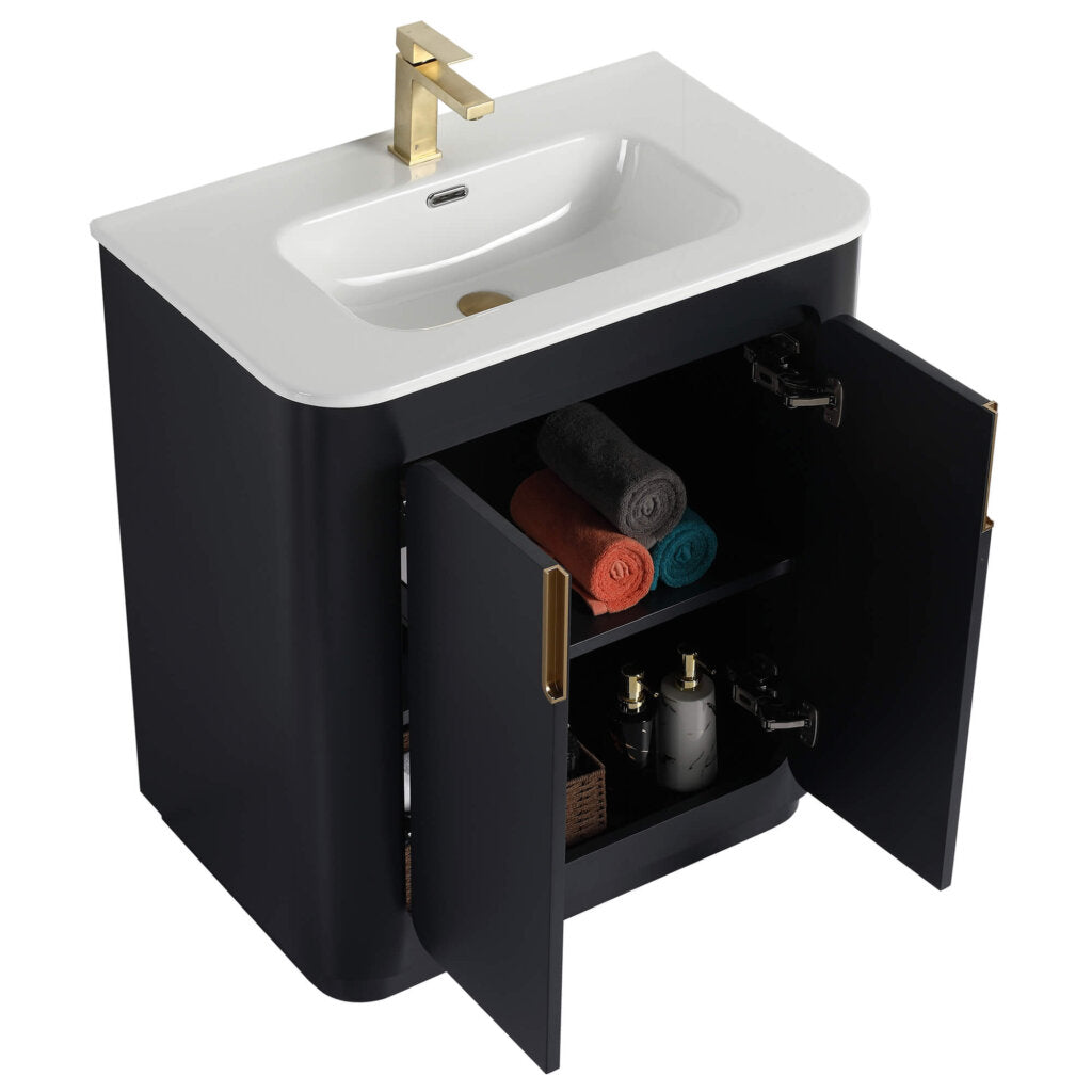 The Shireplace 30 Inch Bathroom Vanity With Sink offers a stylish white basin and gold faucet. Inside its black cabinet, youll find towels in gray, red, and teal, as well as toiletries and a decorative basket on the shelves.