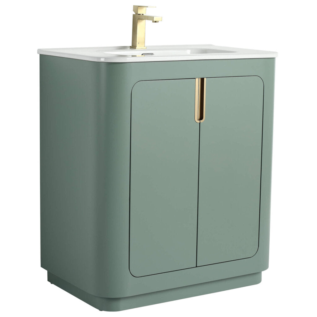 The Shireplace 30 Inch Bathroom Vanity With Sink offers a modern look with a sage green cabinet, two doors, and sleek gold handles. It comes with an integrated white countertop, a rectangular sink, and an elegant gold faucet.