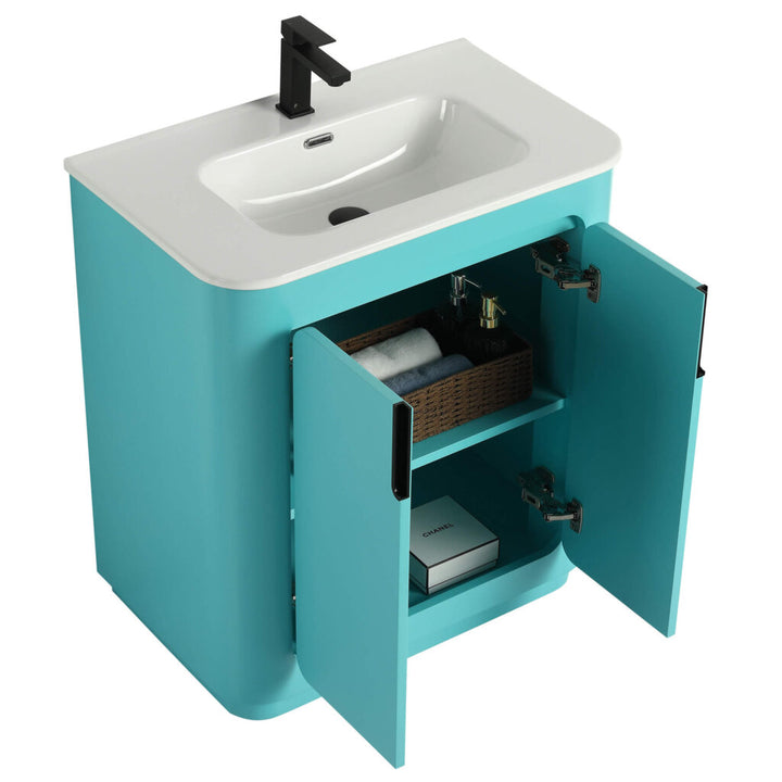 The Shireplace 30 Inch Bathroom Vanity With Sink boasts a turquoise design, white sink, and sleek black faucet. Behind the cabinet doors are shelves for toiletries, towels, and a basket, all in a modern minimalist style.