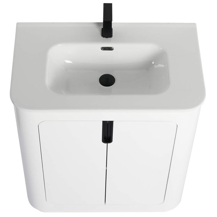 Overhead view of the Shireplace 30 Inch Bathroom Vanity With Sink, showcasing a sleek basin and black faucet. The sink is integrated into a compact cabinet with two doors, highlighting its minimalist design.