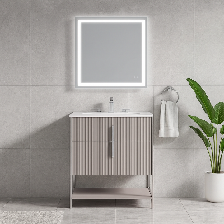 Modern bathroom with the Serenity 24 Inch Bathroom Vanity, a lighted square mirror, towel ring, potted plant, and neutral gray tile walls and floor. The space is clean and minimalistic.