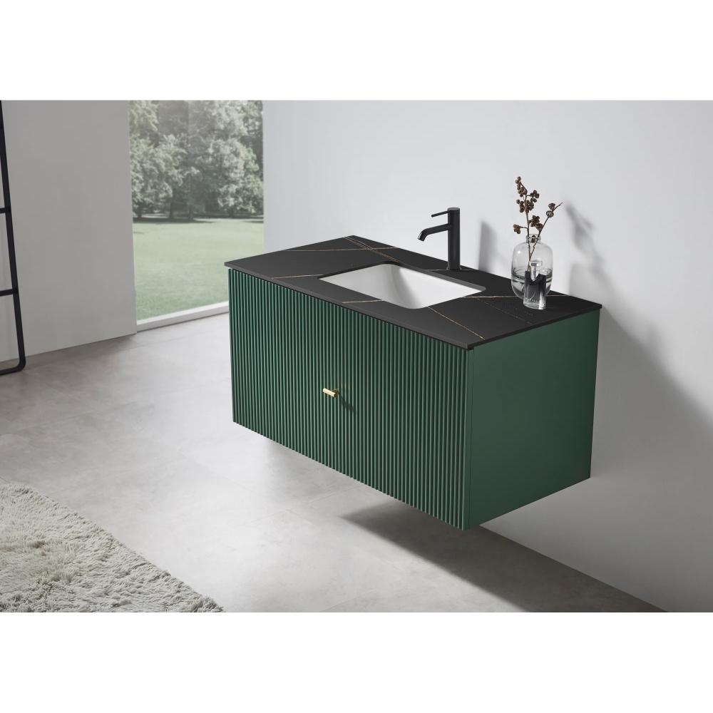 Modern bathroom featuring the Barcelona 42 Inch Wall Mount Bathroom Vanity in green with a black countertop, rectangular sink, and black faucet. A small vase with flowers sits atop, illuminated by natural light from a large window.