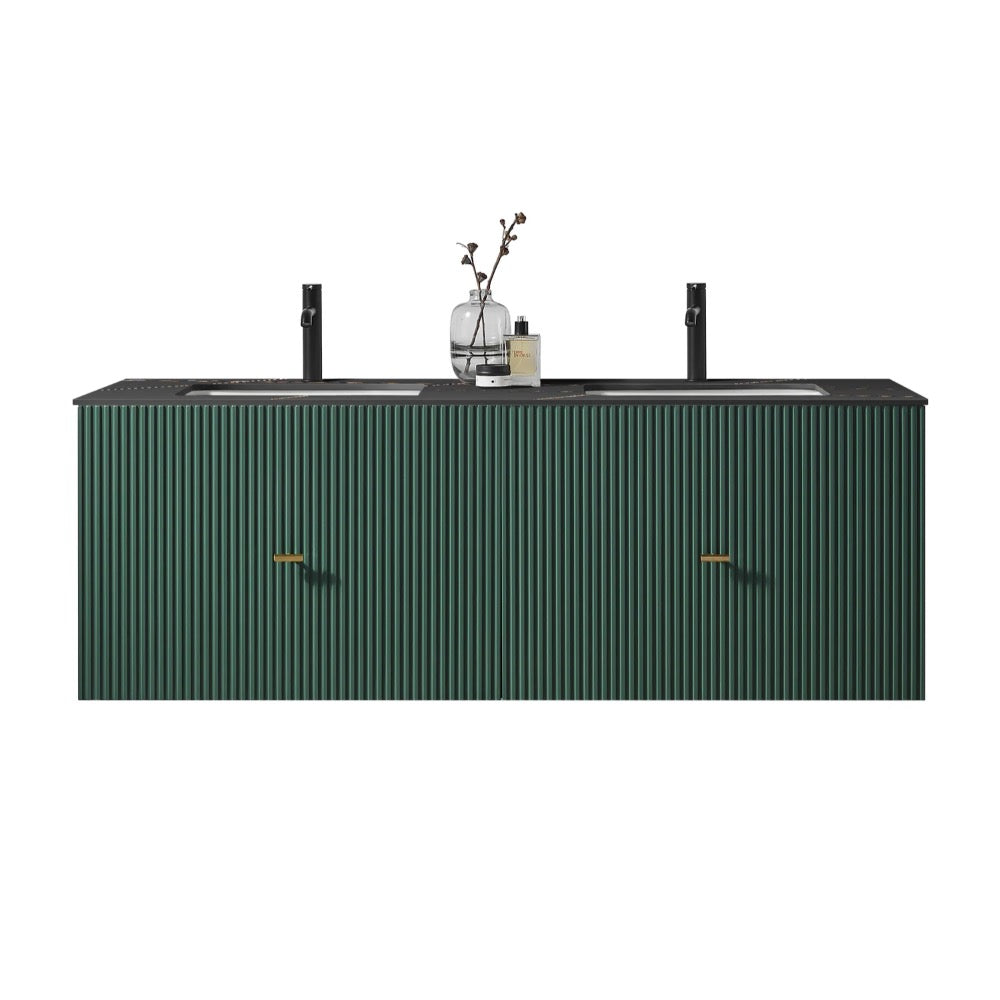 The Barcelona 60 Inch Wall Mount Double Bathroom Vanity With Top features a matte black countertop, dark green fluted cabinet doors, two sleek black faucets, and a small vase with branches placed between the sinks.