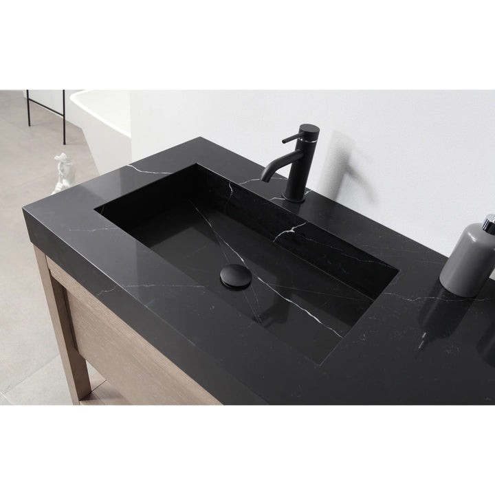 The Bibury 72 Inch Double Bathroom Vanity with Top includes a sleek black rectangular sink, matching faucet, and a soap dispenser on the right, all set on a stylish wooden cabinet against a white wall.