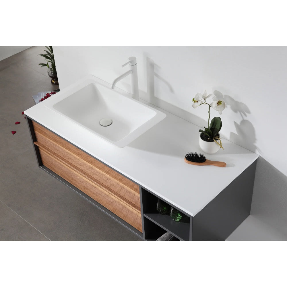 The Goreme 48 Inch Wall Mount Bathroom Vanity With Vessel Sink features a modern design with a white vessel sink, tall faucet, orchid plant, hairbrush on wooden drawers and open shelves, all atop light gray tile flooring.