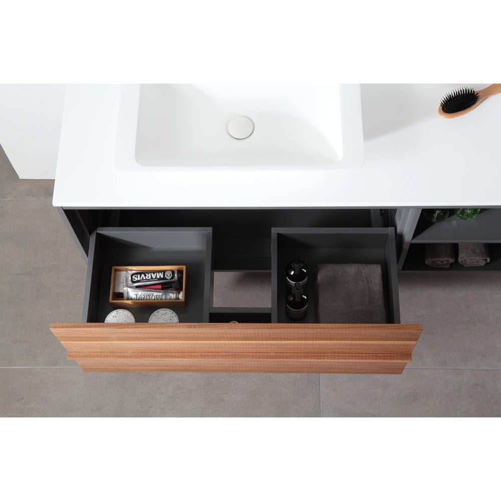The Goreme 48 Inch Wall Mount Bathroom Vanity With Vessel Sink features an open drawer showing organized compartments for a hairbrush, bottles, round containers, a soap box, and a folded towel.
