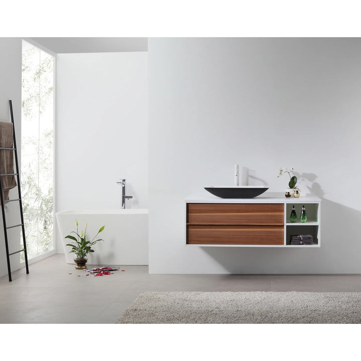 A minimalist bathroom features the Goreme 48 Inch Wall Mount Bathroom Vanity With Vessel Sink, a freestanding tub, ladder towel rack, wood drawers, round black basin sink, toiletries, potted plant, and an orchid in a bright white space.