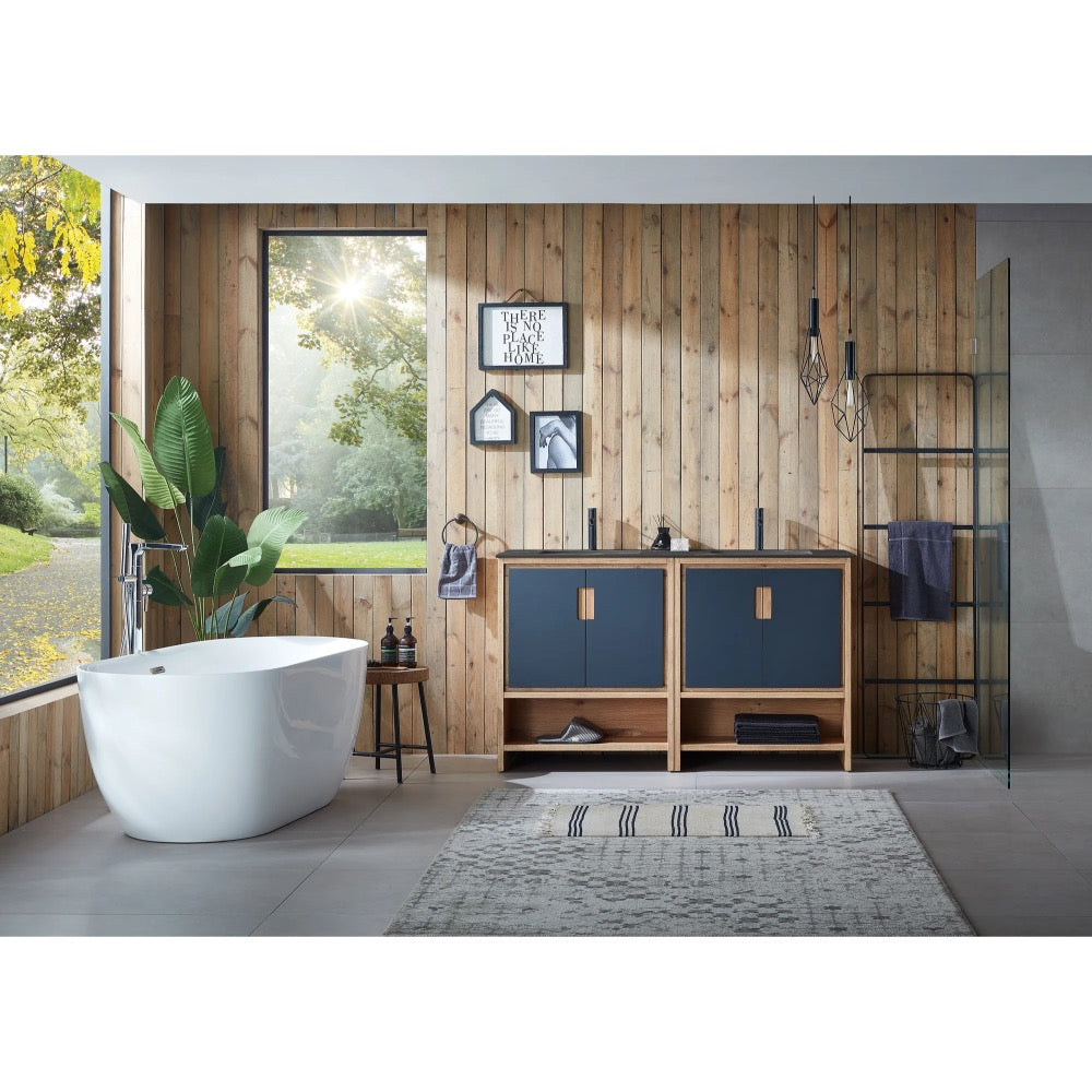 Modern bathroom with wood-paneled walls, a freestanding white tub, large garden-view window, Lyon 60 Inch Double Bathroom Vanity with Top in blue and wood, pendant lights, plants, and a gray rug on tile floor.