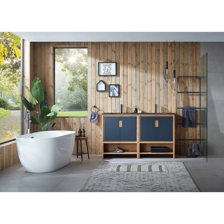 Modern bathroom with wood-paneled walls, a freestanding white tub, large garden-view window, Lyon 60 Inch Double Bathroom Vanity with Top in blue and wood, pendant lights, plants, and a gray rug on tile floor.