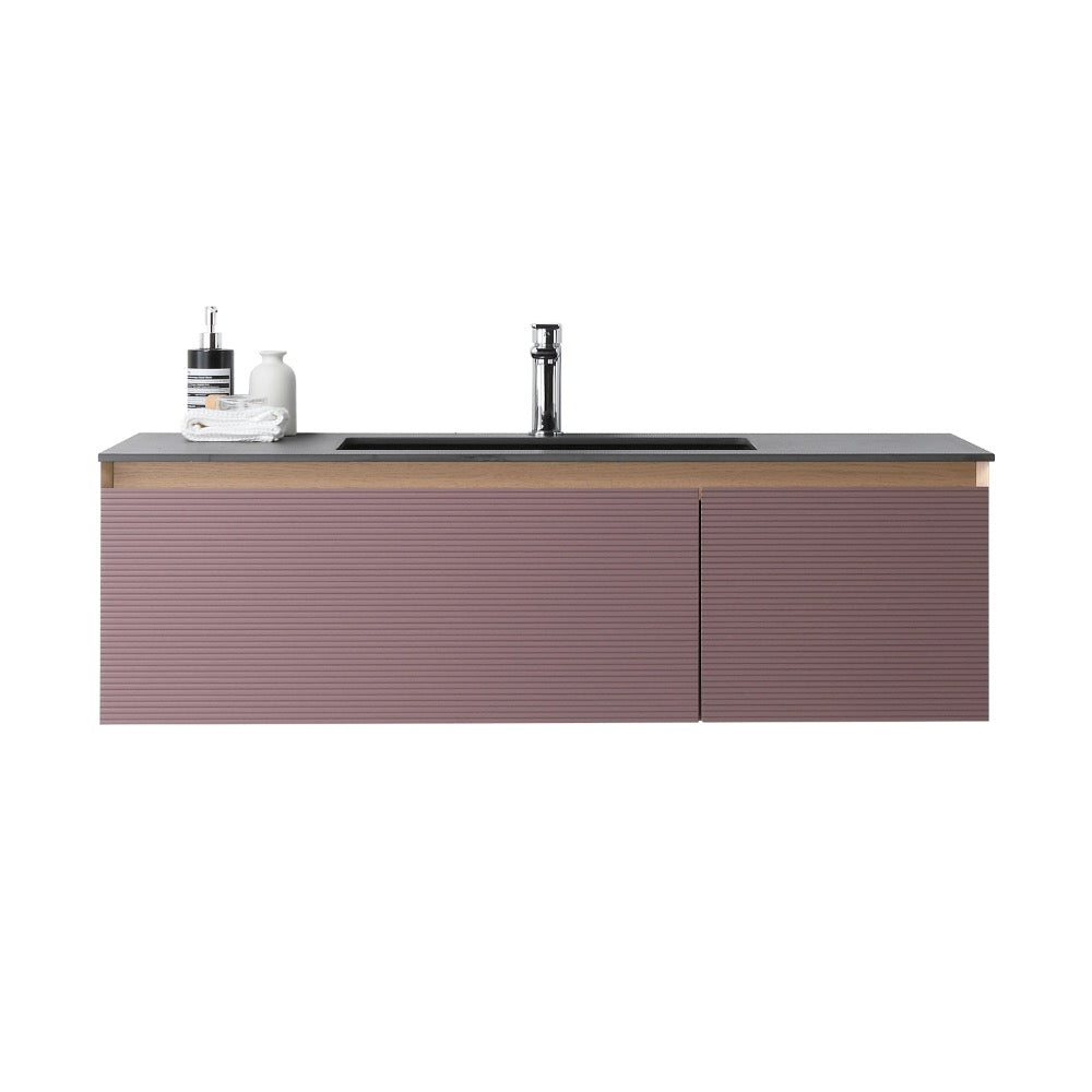 The Oslo 48 Inch Wall Mount Bathroom Vanity showcases a ribbed mauve front, dark countertop, integrated sink, chrome faucet, and left-side soap dispensers for a sleek modern look.
