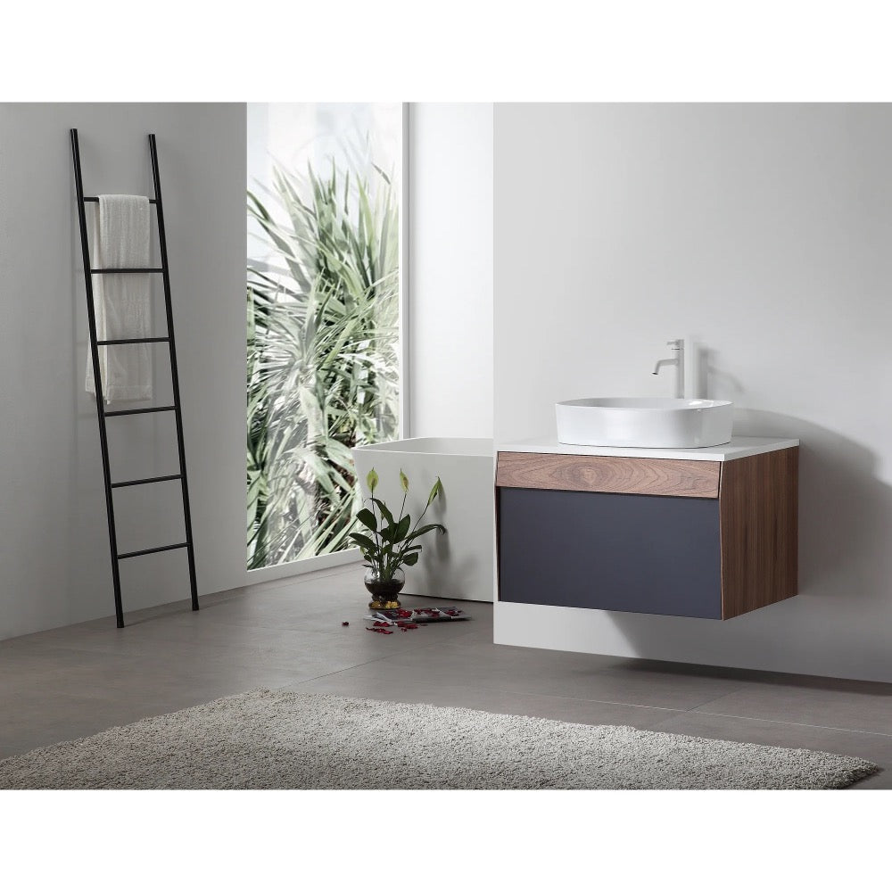Modern bathroom with a Ronda 30 Inch Wall Mount Bathroom Vanity with vessel sink and sleek faucet. A ladder towel rack and houseplant sit by a large window with greenery outside. Light gray rug on smooth flooring.