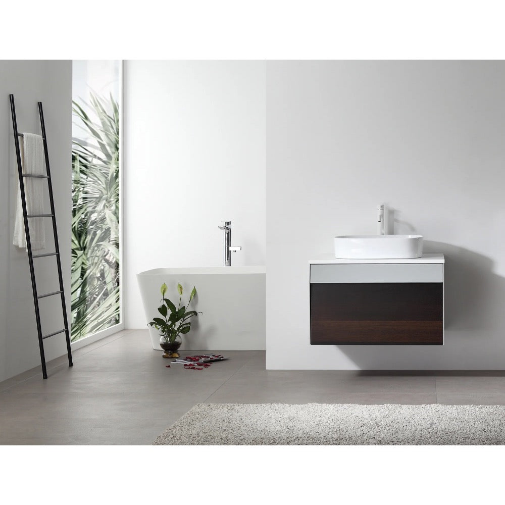 Modern minimalist bathroom with a Ronda 30 Inch Wall Mount Bathroom Vanity with vessel sink, a freestanding white tub, ladder-style towel rack, potted plant, and sunlight streaming through a window framed by leafy plants.