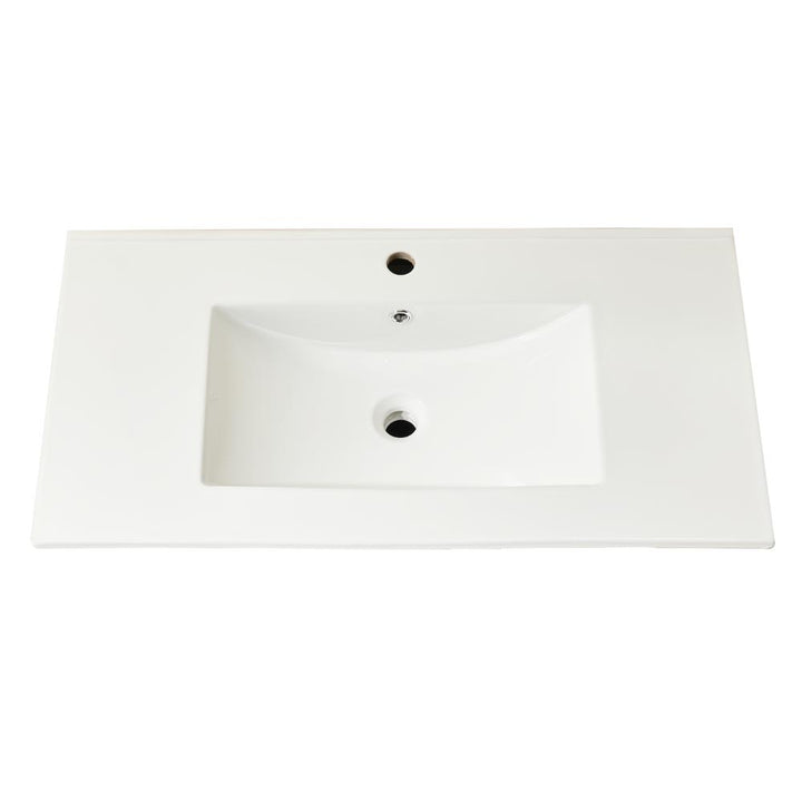 Rectangular white bathroom sink with a wide, flat countertop, central basin, and two faucet holes—ideally designed to complement the Linea 36 Inch Wall Mounted Bathroom Vanity.