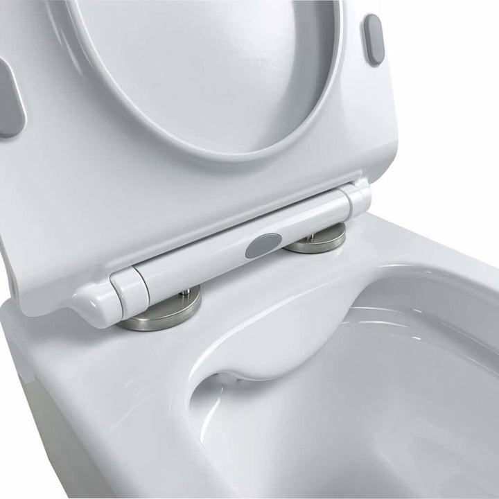 Close-up of a Dakota Wall Hung Toilet with the seat lifted, revealing a cylindrical bidet attachment installed at the back of the bowl.
