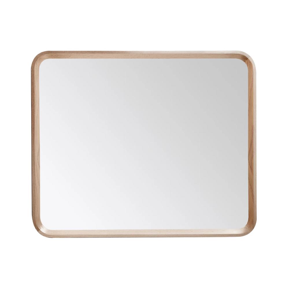 Vela Mirrors have a rectangular shape, light wooden frame, and rounded corners, providing an elegant reflection against a white background.