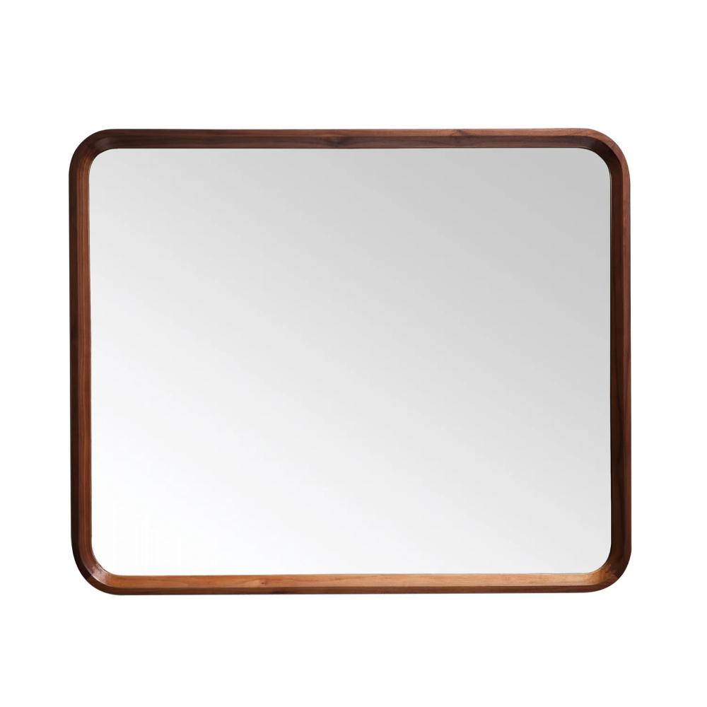 The Vela Mirrors feature a rectangular design with a smooth dark wood frame and rounded corners, shown here reflecting a simple white background.