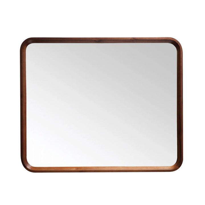 The Vela Mirrors feature a rectangular design with a smooth dark wood frame and rounded corners, shown here reflecting a simple white background.