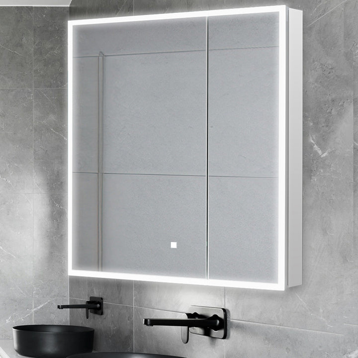A modern bathroom features the Edge Royal 30 Inch LED Lighted Mirror Medicine Cabinet above a matte black sink and faucet, all set against gray tiled walls.