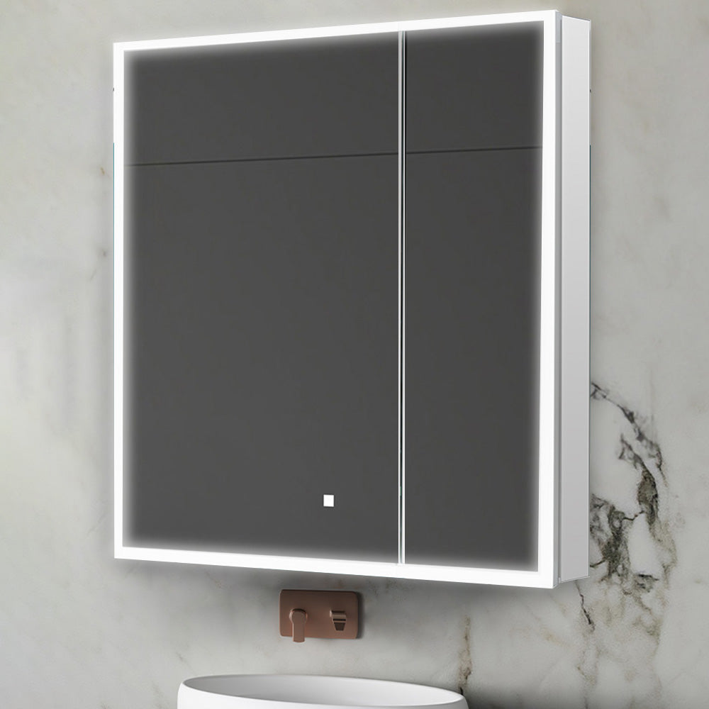 The Edge Royal 36 Inch LED Lighted Mirror Medicine Cabinet features a modern, wall-mounted design with a dark mirrored front, edge LED lighting, and a touch sensor, positioned above a white sink on a marble wall.