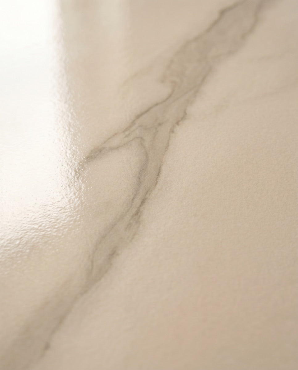 A detail of marble-look porcelain tile veining in matte and polished finishes.