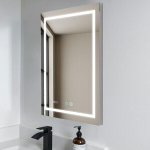 A Daytona 24 Inch x 36 Inch LED Lighted Bathroom Mirror with edge lighting is mounted above a sink with a black faucet, while a brown soap dispenser rests on the white countertop.