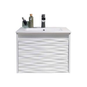 A modern white bathroom vanity with a textured, wavy front panel, a rectangular sink, a black faucet, a soap dispenser, and two bottles on the countertop, set against a plain white background.