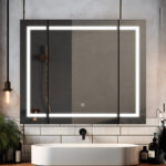 A modern bathroom vanity with a round white sink, sleek black faucet, glass shower wall, hanging bulb light, plants on a tiled counter, and the Royale Plus 36 Inch x 30 Inch LED Lighted Mirror Medicine Cabinet.