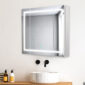 A modern bathroom features a round white sink, black faucet, and a Royale Plus 36 Inch x 30 Inch LED Lighted Mirror Medicine Cabinet above, reflecting tiled walls. Two soap dispensers sit on the wooden counter beside the sink.